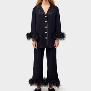 BNWT Sleeper feather pyjamas with feathers!! XL, black.